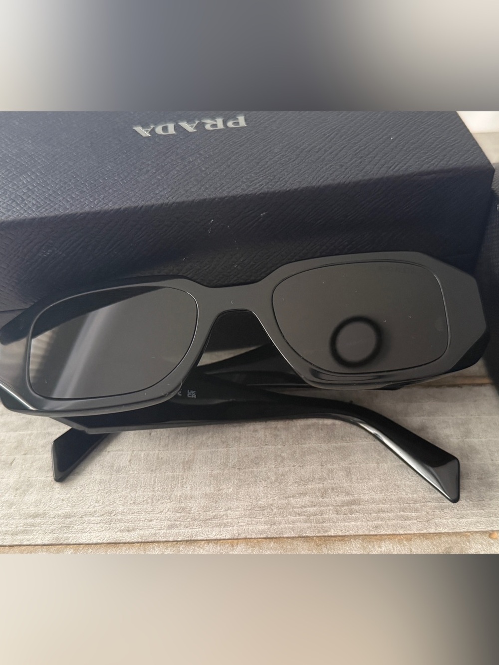 Prada Black women’s Sunglasses with Faceted Temple